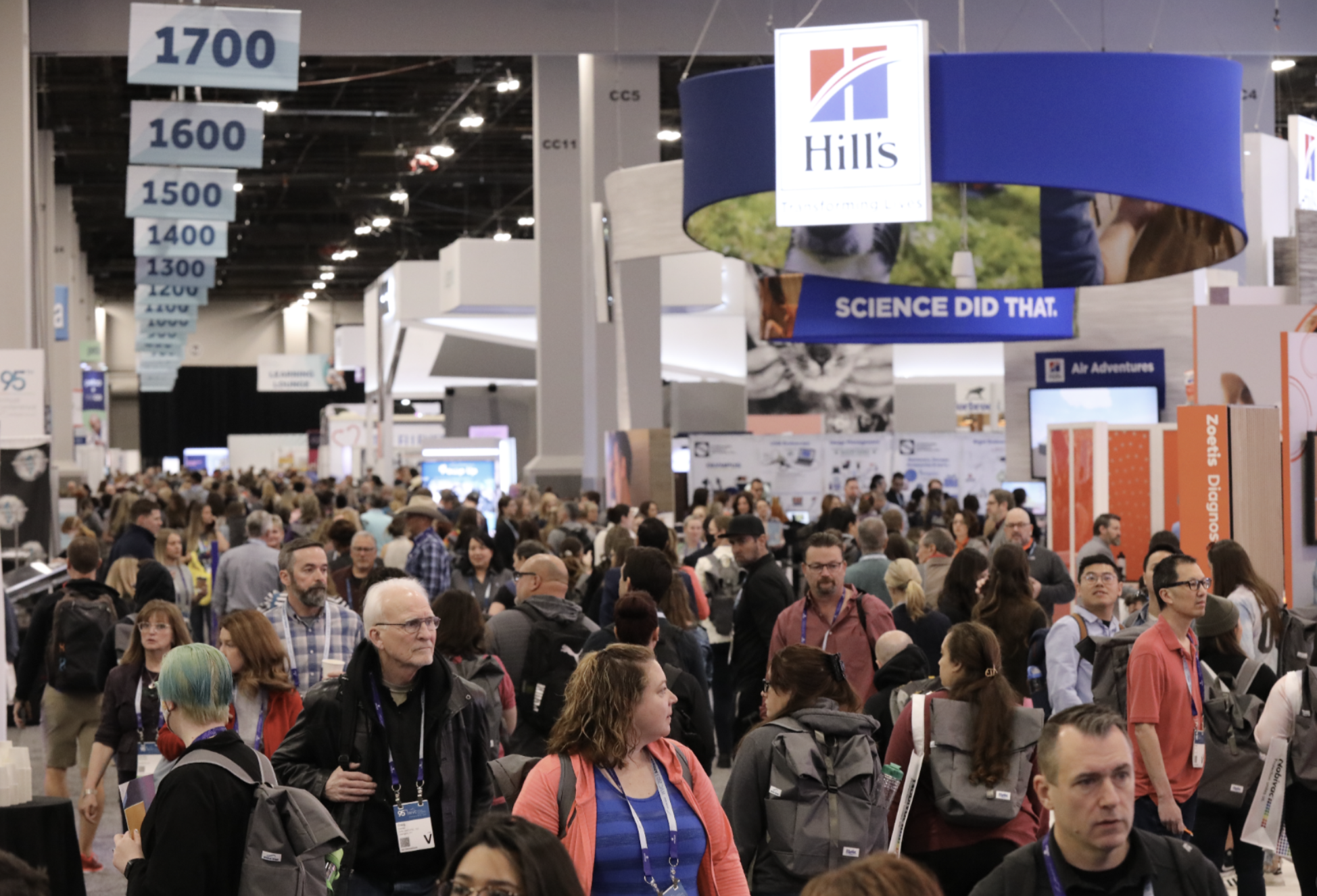 Large group of people walking through the WVC Annual Conference Exhibit Hall to explore health and life sciences in Las Vegas